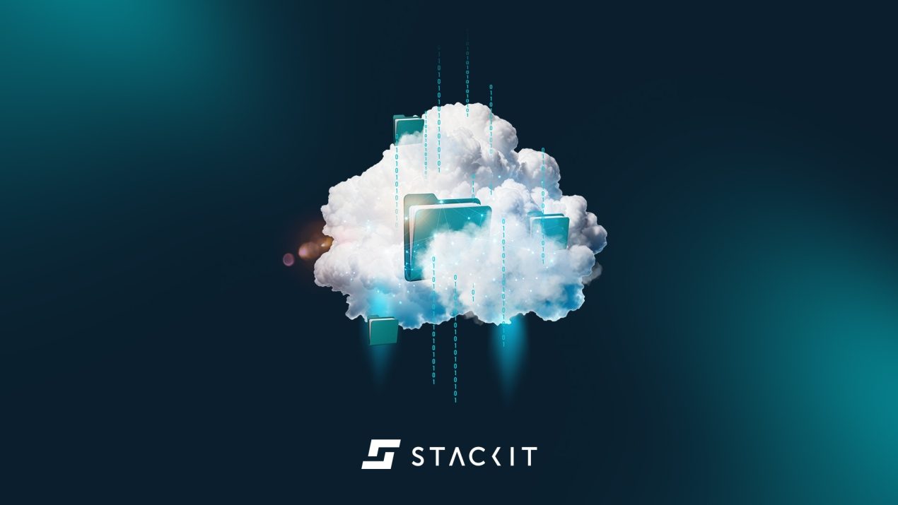 The image shows a realistic white cloud floating in the center of a dark blue background. Several turquoise file folders protrude from the cloud, appearing partially transparent and networked by fine connecting lines. The scene is traversed vertically by strands of blue zeros and ones, symbolizing data streams. At the bottom edge is the "STACKIT" logo in white.