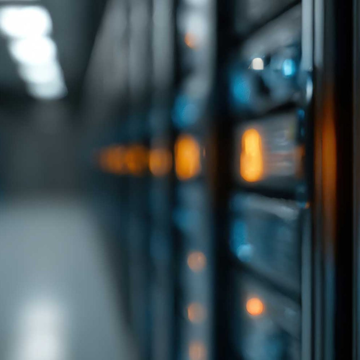 Modern data center aisle featuring a glowing orange padlock icon on a server rack. The image symbolizes maximum IT security, reliable data protection, and the secure operation of critical infrastructure in the cloud.