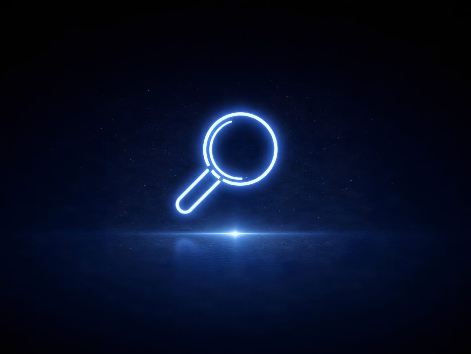 A glowing blue neon symbol of a magnifying glass centered on a dark, blurred background above a bright light point, representing search or investigation.