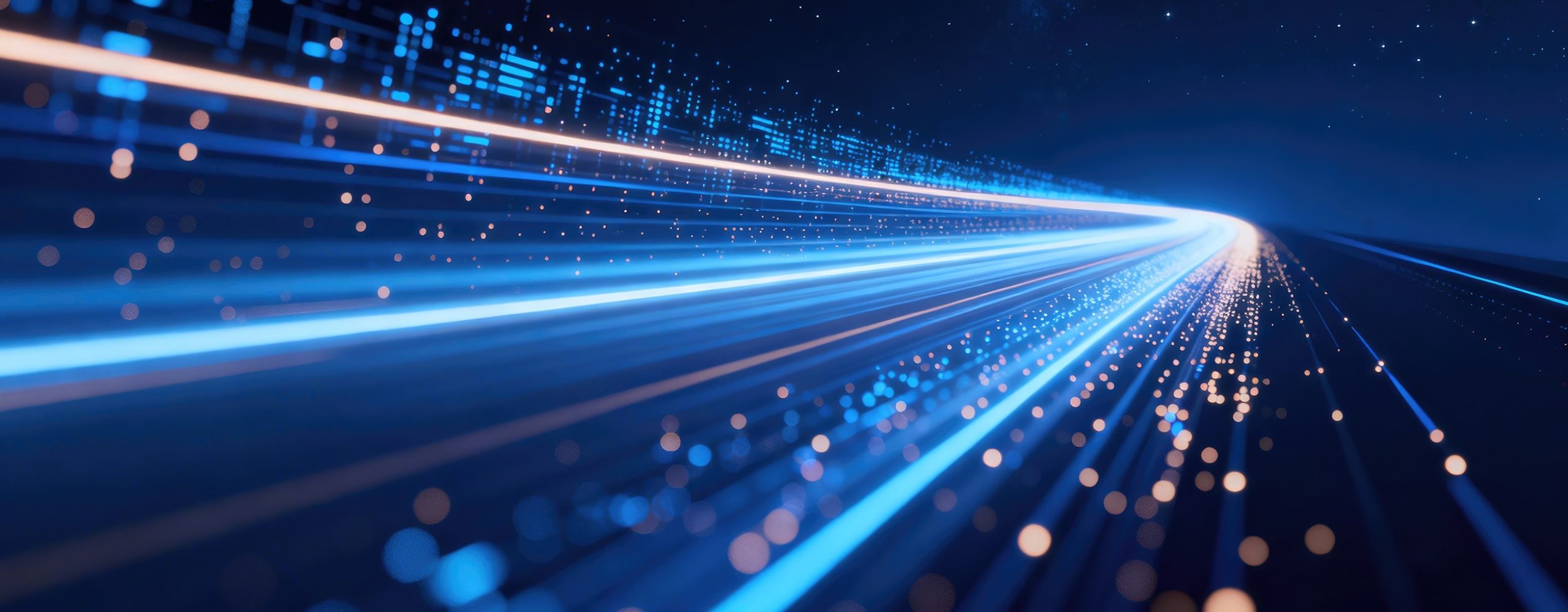 Abstract representation of fast, glowing data streams through blue and orange light trails on a dark background, visualizing rapid data transfer and digital cloud networks.
