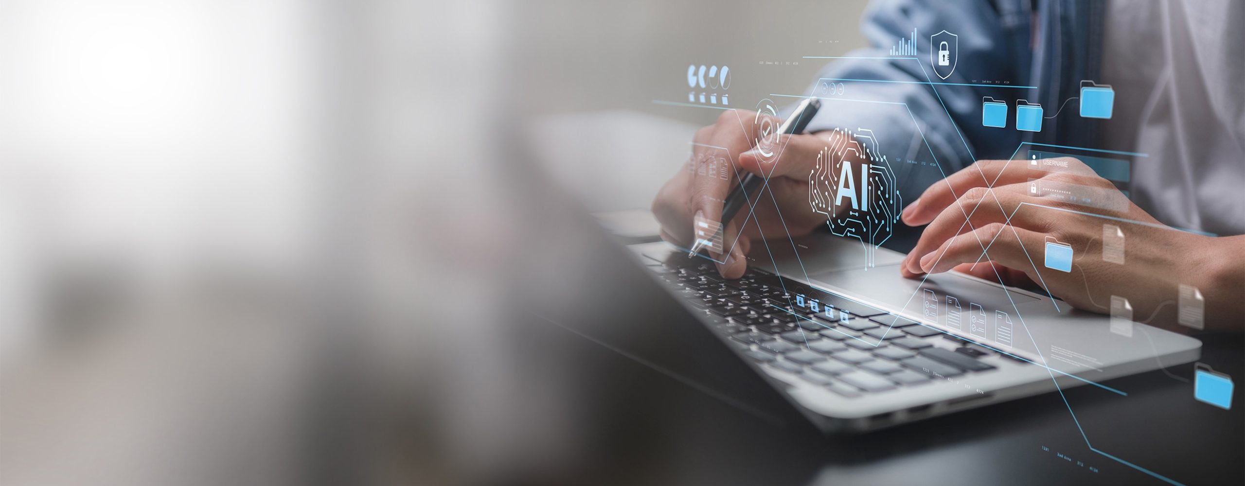 Close-up of hands working on a laptop while holding a stylus pen, overlaid with blue digital graphics showing an AI brain icon, security shield, folders, and document management interfaces. This image is AI-generated.